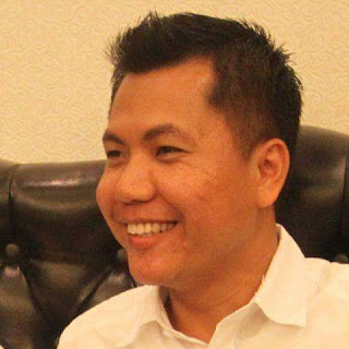 Sekretaris Gerindra Sulut Melky Suwawa 